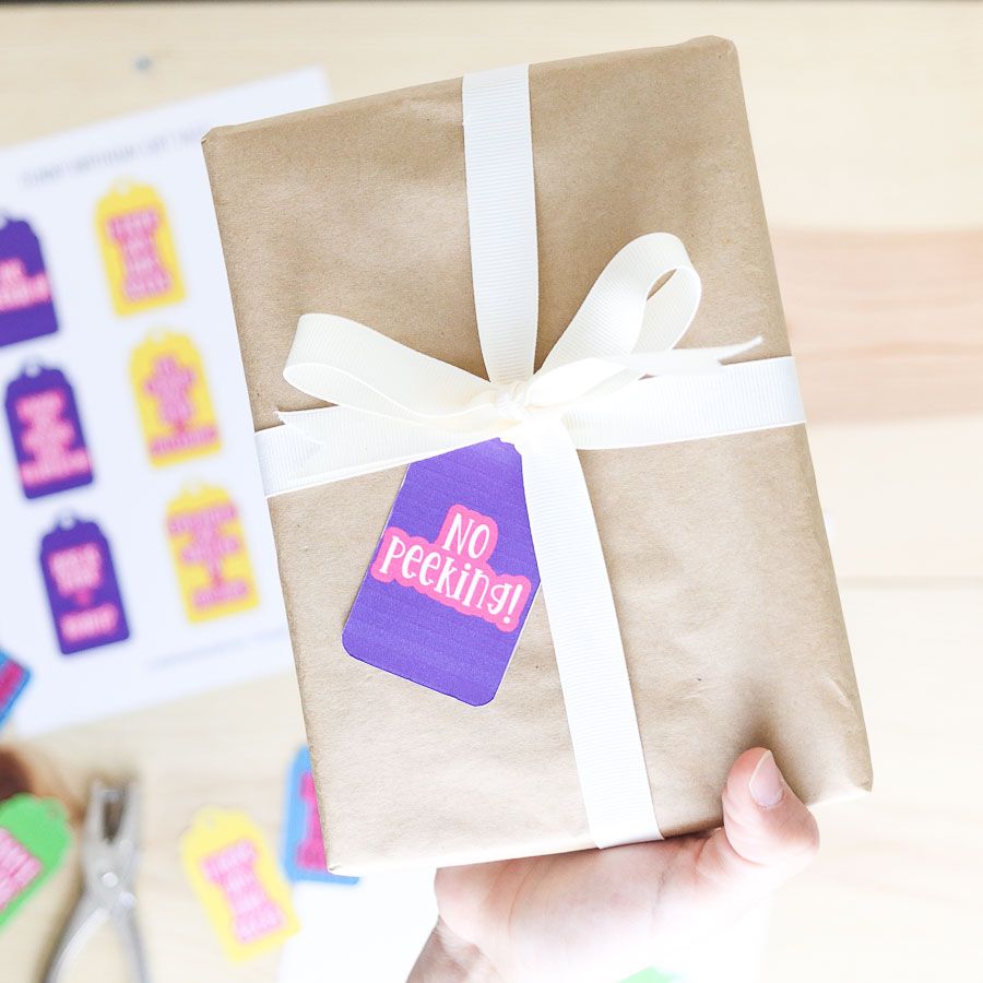 Wrapped present with a funny birthday gift tag