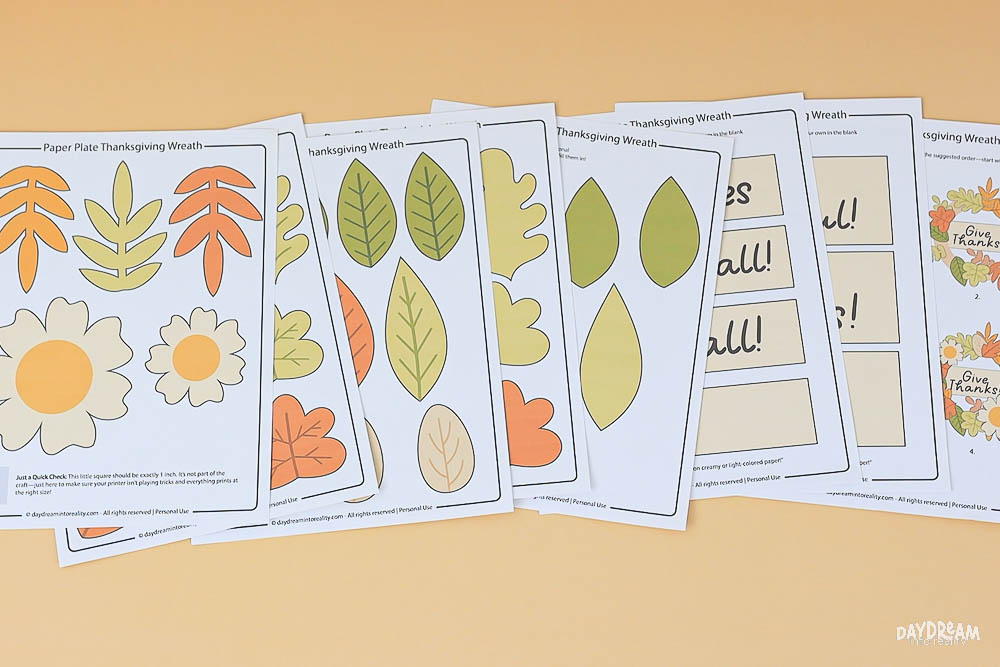 Printed Free printable template pages for paper plate Thanksgiving wreath craft, including fall leaves, flowers, message banners, and assembly guide for kids.
