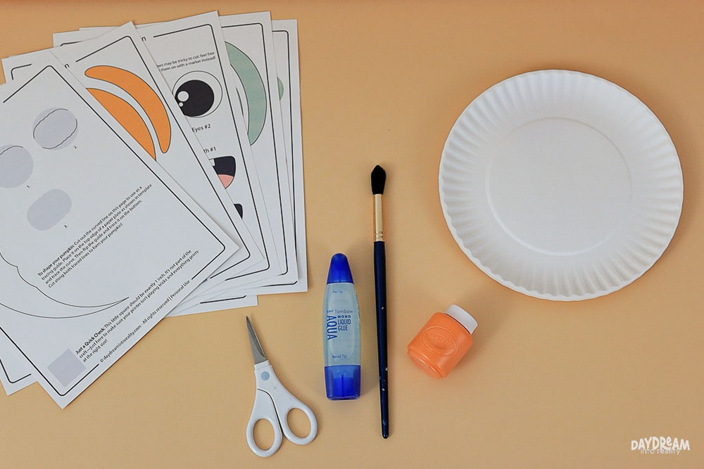 materials for making a paper plate pumpkin