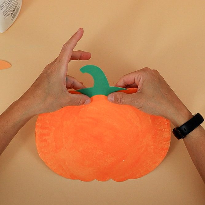 gluing stem on pumpkin
