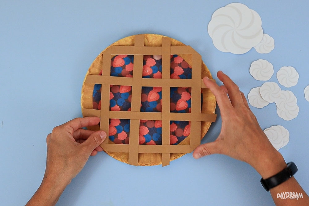 fitting lattice crust onto paper plate mixed verry pie craft