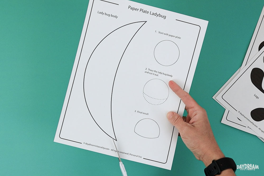 Cutting paper plate ladybug template