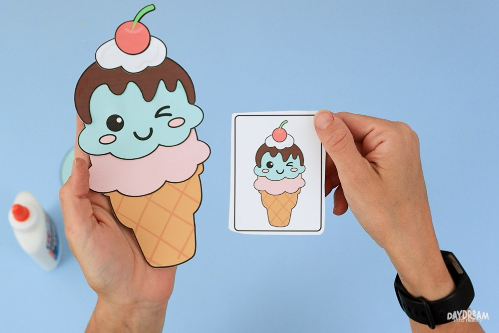 Finished easy ice cream craft next to the printable guide card.