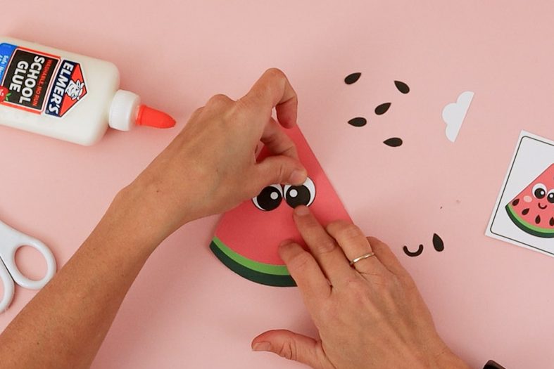 Glue eyes to watermelon.