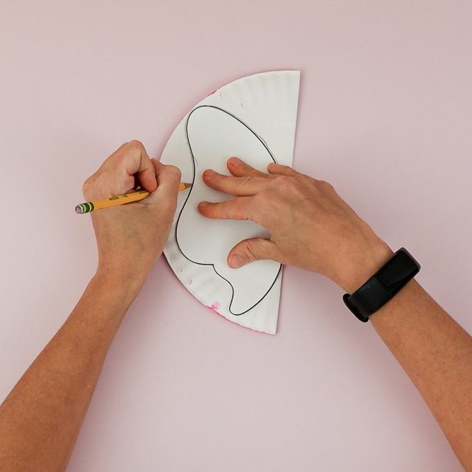 Trace butterfly shape on paper plate