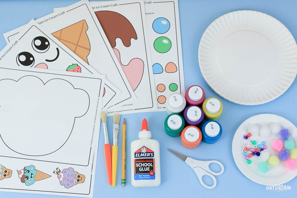 Materials for making a paper plate ice cream craft for kids.