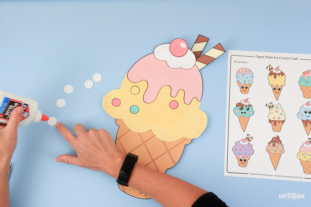 Glue sprinkles to ice cream scoop