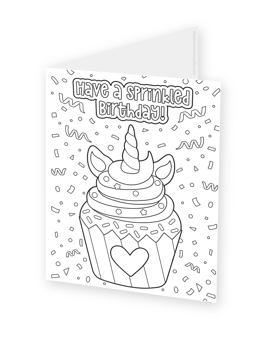 Foldable coloring card featuring a unicorn cupcake with a heart, sprinkles, and Have a Sprinkled Birthday lettering.
